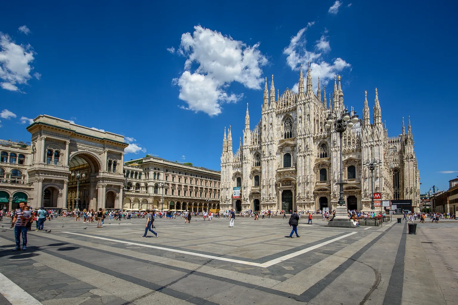 Original daytime photograph of Piazza del Duomo by kuhnmi, with people in the square